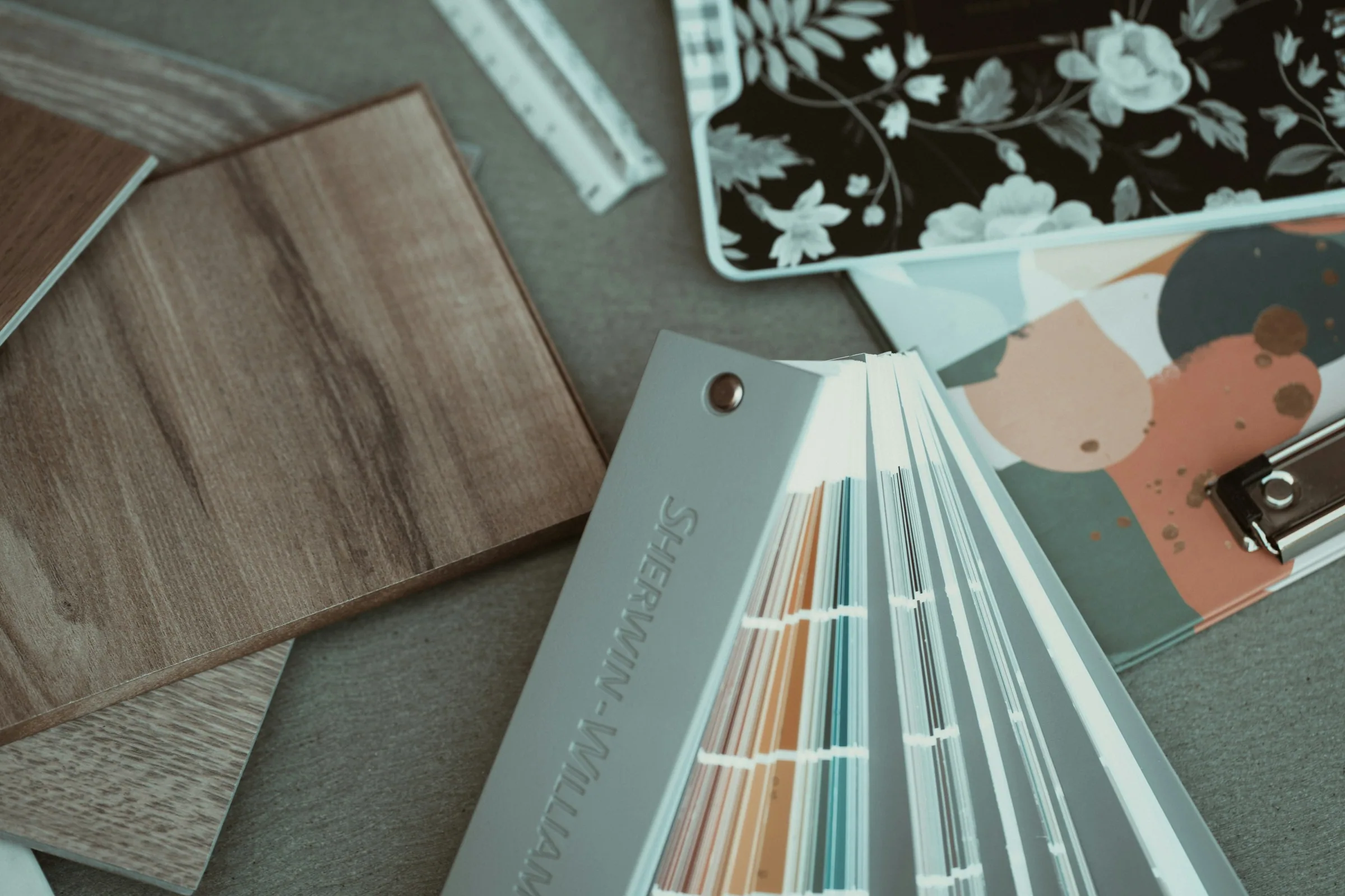 Wood samples, color cards and pattern swatches used to explain sourcing specifications