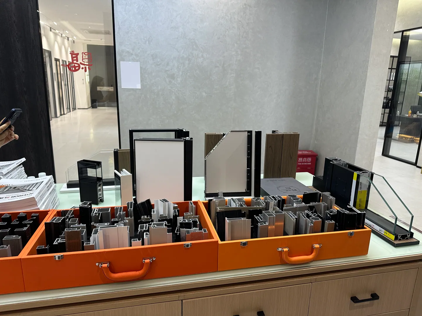 Home 1 Aluminium profile, finish and hardware samples reviewed during VELA Home Global supplier sourcing in Foshan