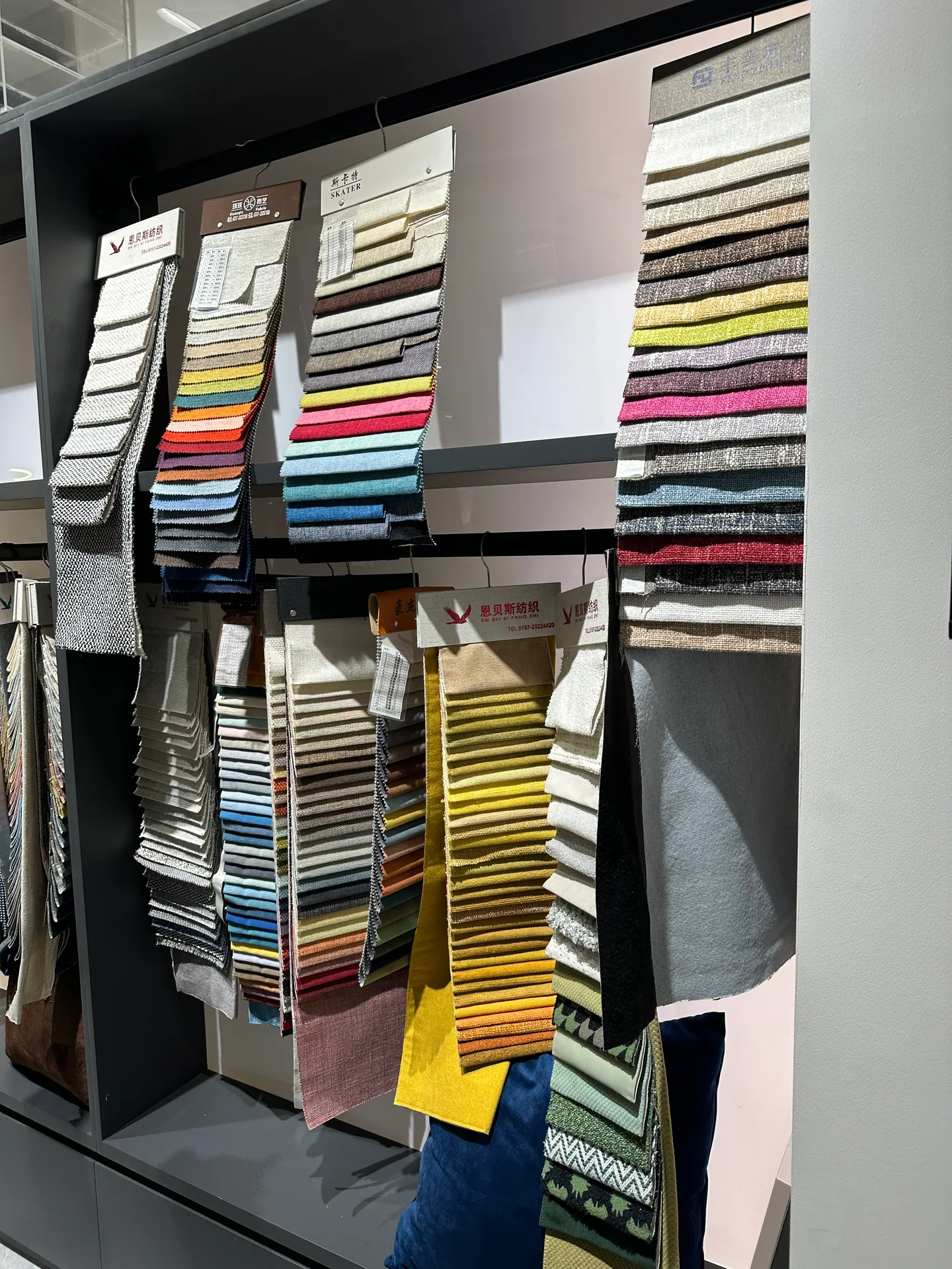 Home 6 Upholstery fabric swatches evaluated for furniture and FF&E sourcing in Foshan