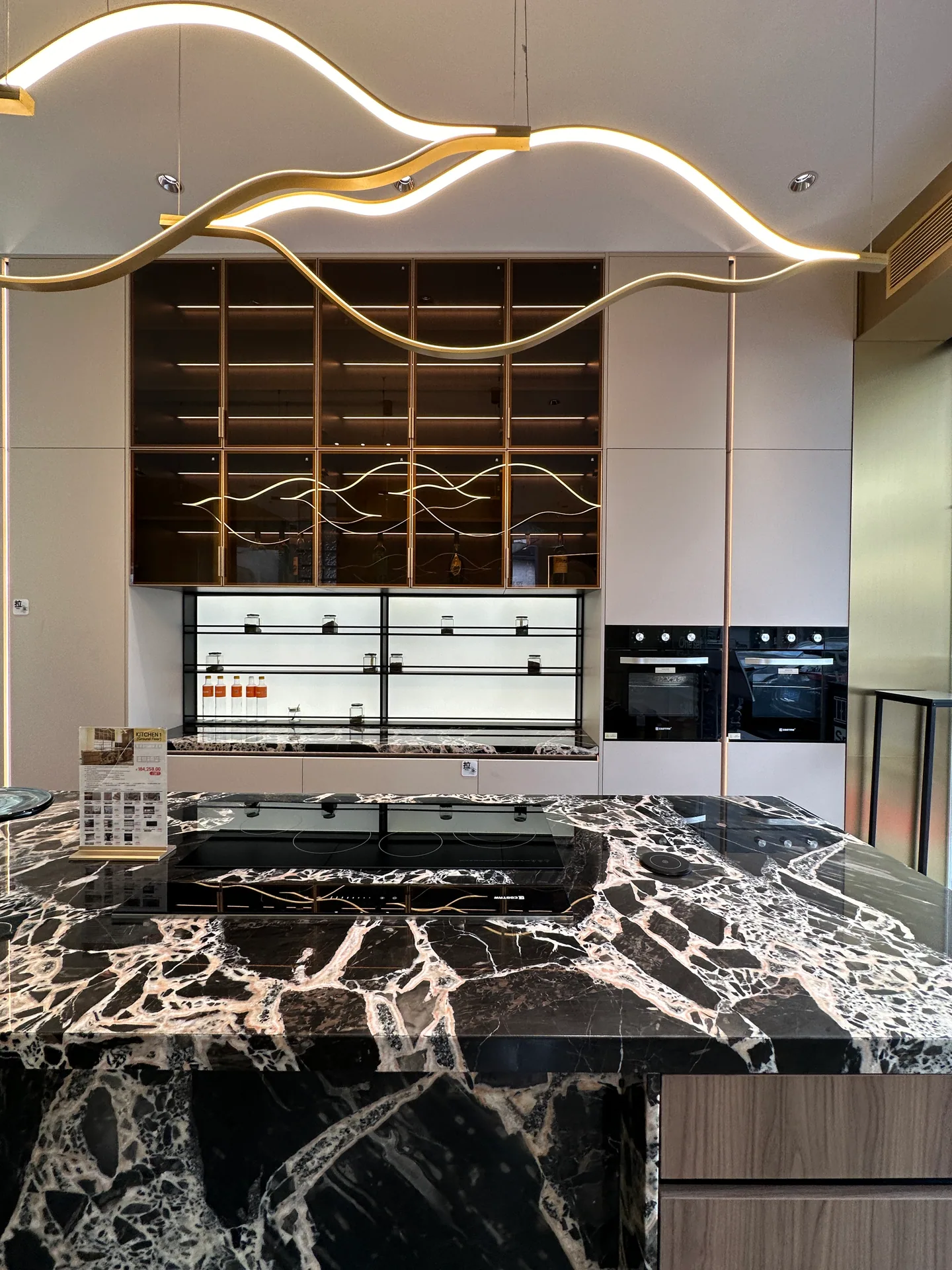 Stone kitchen island and cabinet finish combination for specification review
