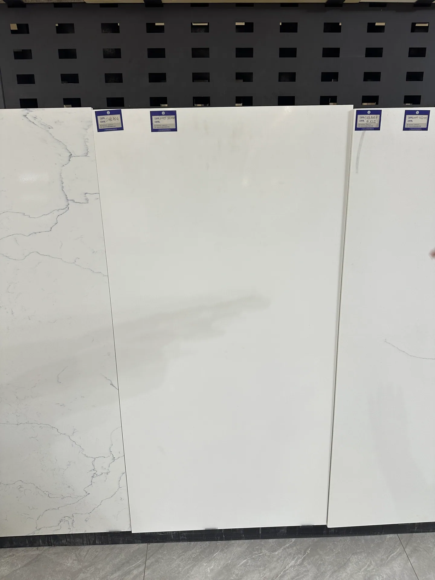 Large format porcelain slab reviewed for surface consistency