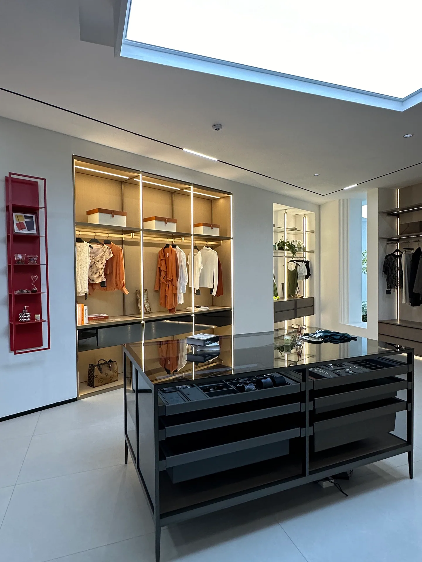 Walk-in wardrobe system displayed in a Foshan joinery showroom